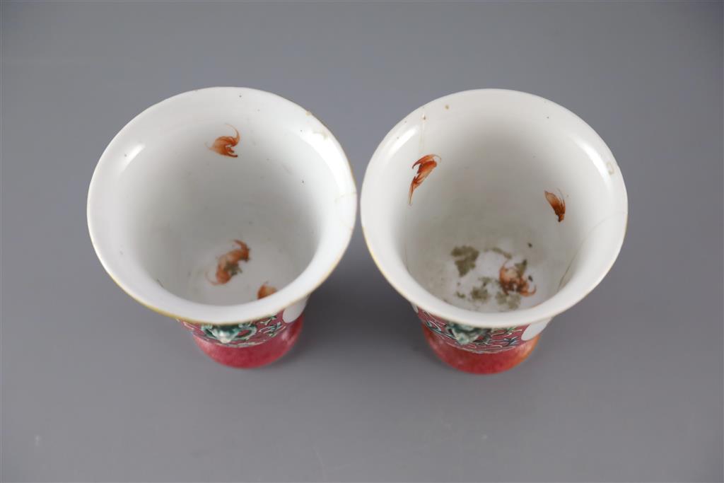 A rare pair of Chinese yangcai New Year Longevity stem cups, Qianlong or Jiaqing period, 11cm high